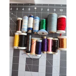16 spools of various colors/brands/types of thread B39